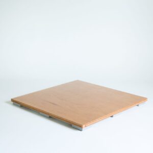 A wooden platform with metal edges on a white background.
