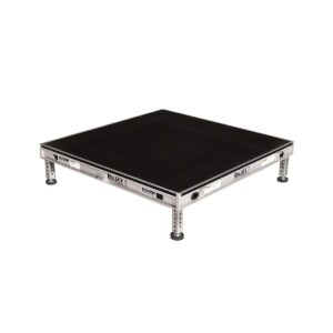 Square black stage platform with metallic legs.